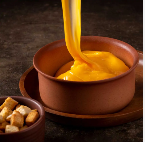 Queijo Cheddar derretido
