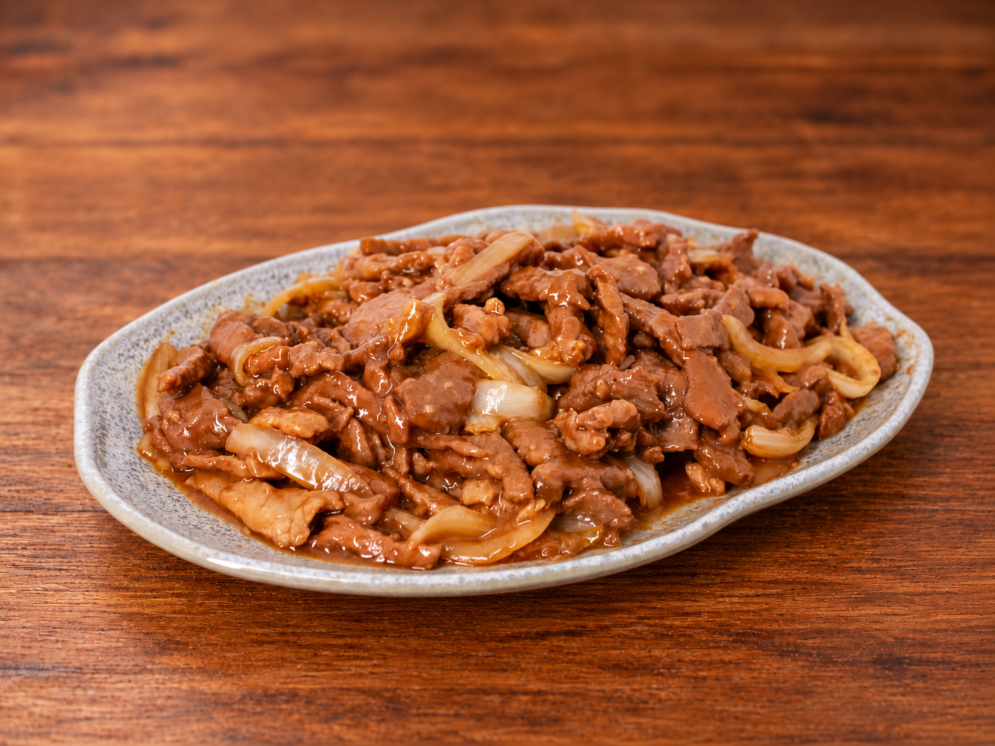 Carne de vaca acebolada