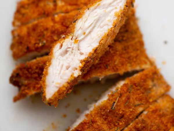 Tiras de frango à milanesa + mandioca frita