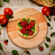 ESFIHA RÚCULA E TOMATE SECO 