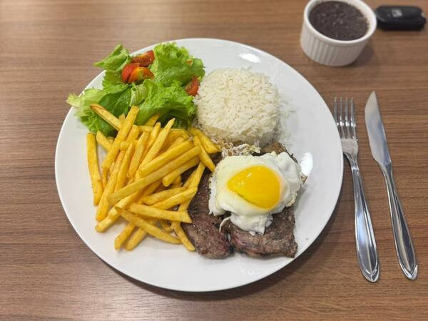 Bife acebolado