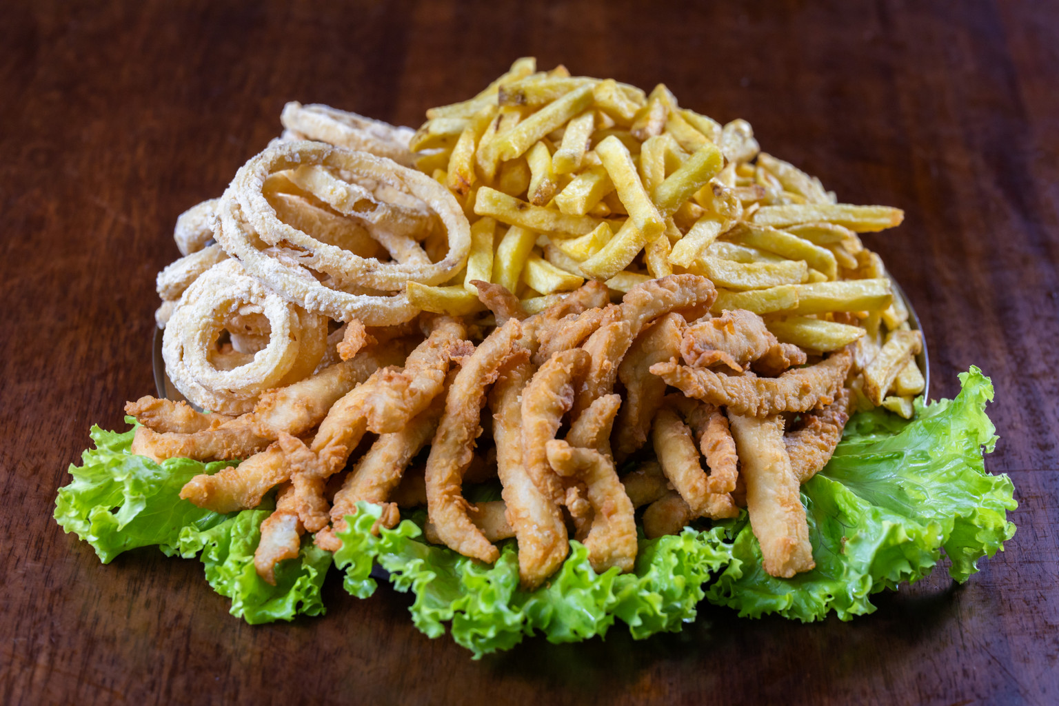 FILE DE TILAPIA C CEBOLA EMPANADA E FRITAS