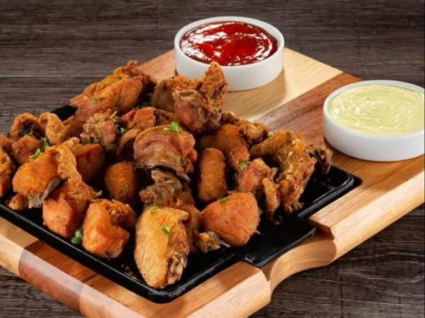 Porção de Frango á Passarinho