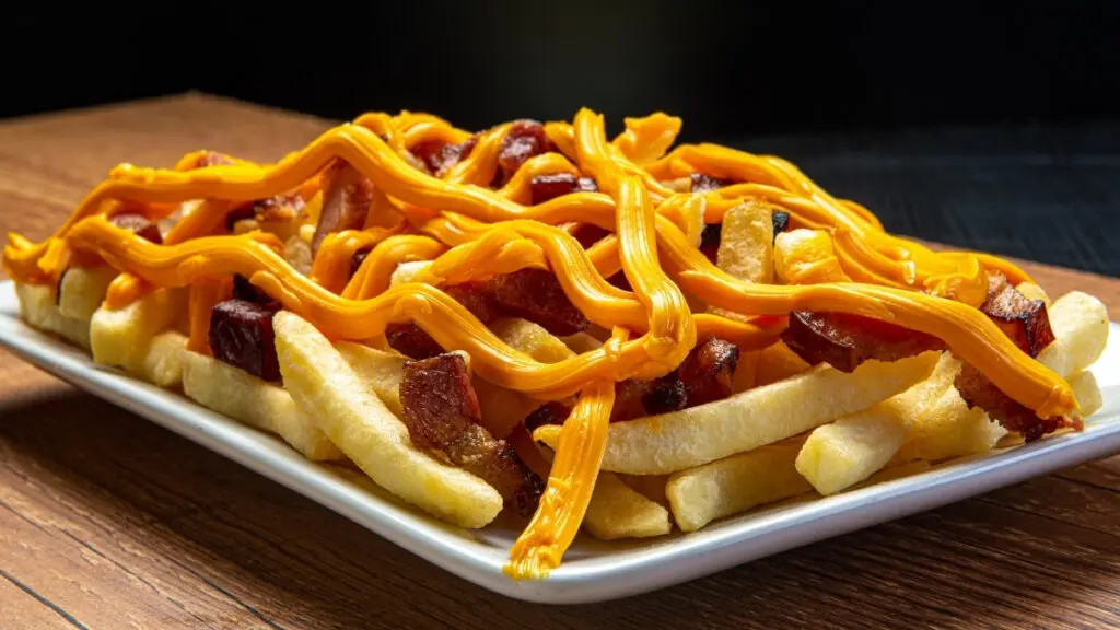 Batata frita Grande + Bacon + cheddar