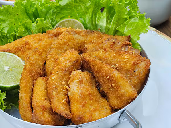 File de tilapia empanado