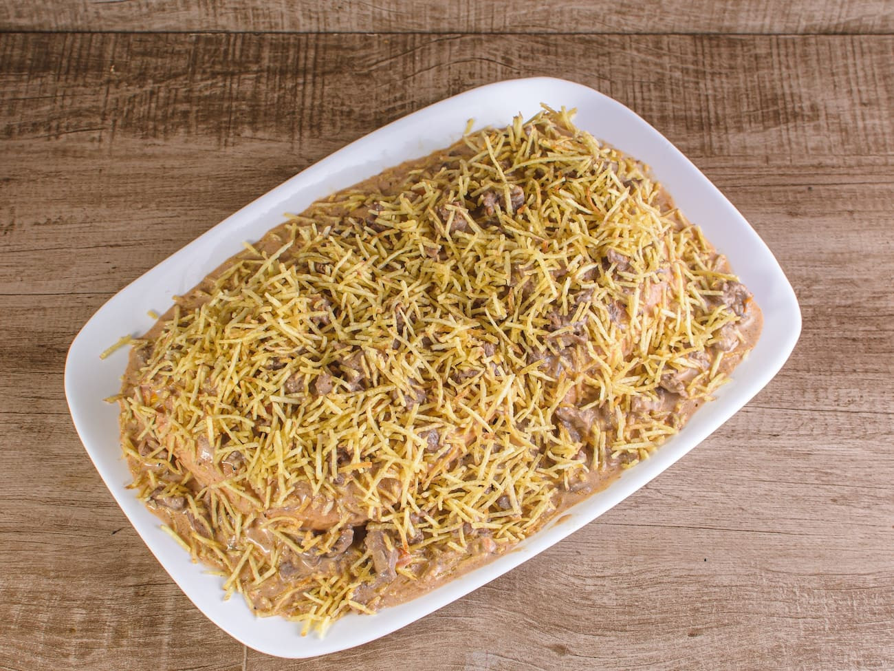 X strogonoff com batata palha (meio)