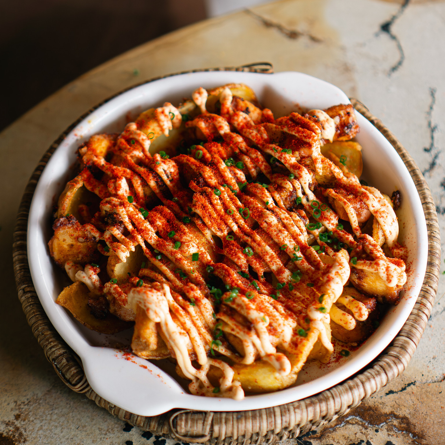 Polvo grelhado com batatas bravas